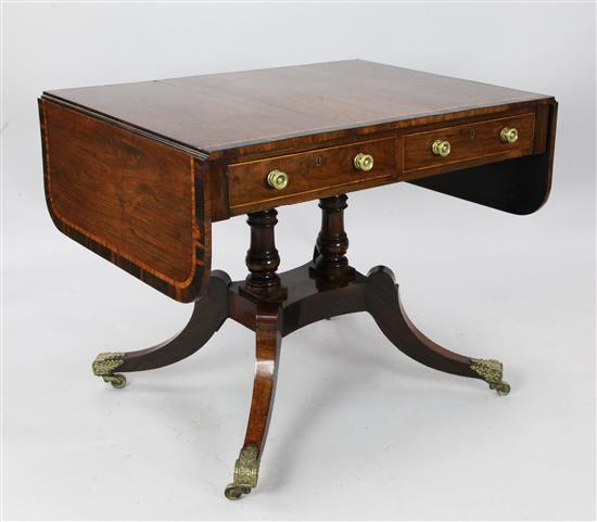 A Regency rosewood and coromandel cross-banded sofa table, W. 3ft. D. 2ft 3in. H. 2ft 5in.